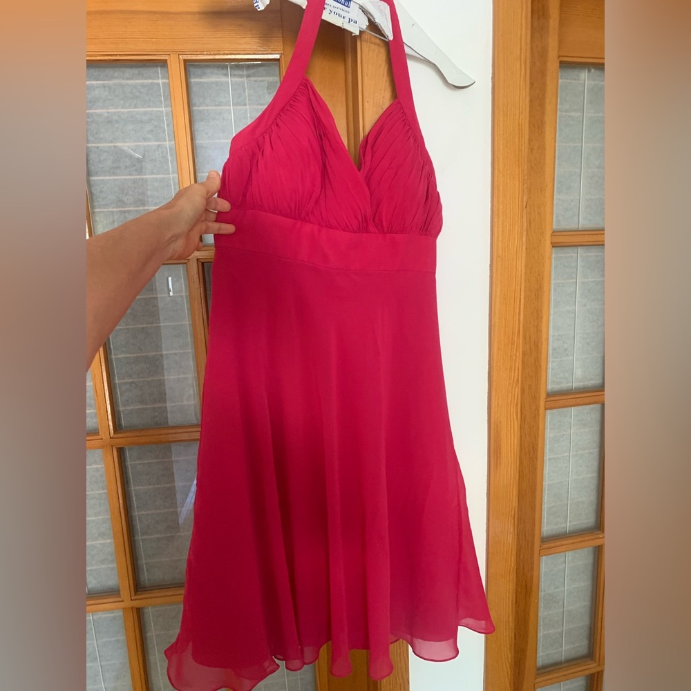Fushia halter dress size 12 as new but fits smaller, flare in waist